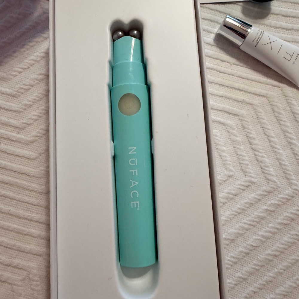 NuFACE Mini Microcurrent Facial Toning Device in Aqua Blue